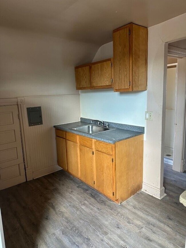Building Photo - Introducing a cozy studio apartment in the...