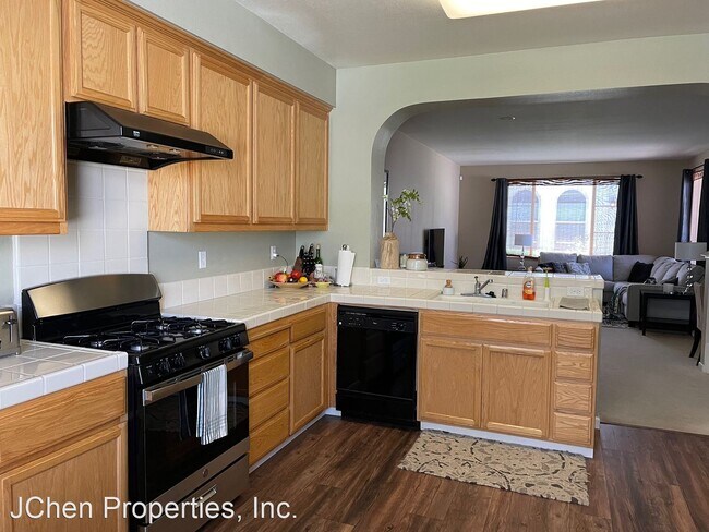 Building Photo - 4 br, 2.5 bath House - 2227 Amaryllis Cir.