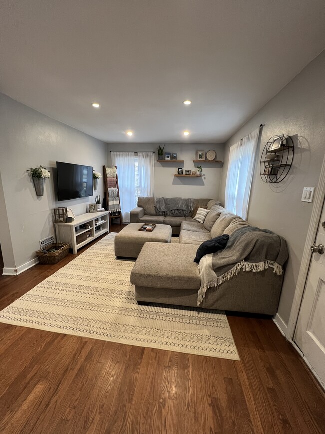 Open concept living room, dining room & kitchen. Fully remodeled and updated - 7336 Tapper Ave