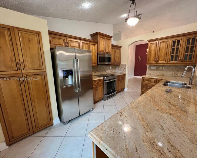 Foto del edificio - 4541 Little Palm Ln
