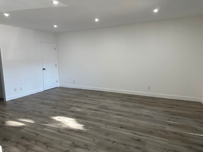 Living Room with Recessed Lighting - 1850 Camden Ave