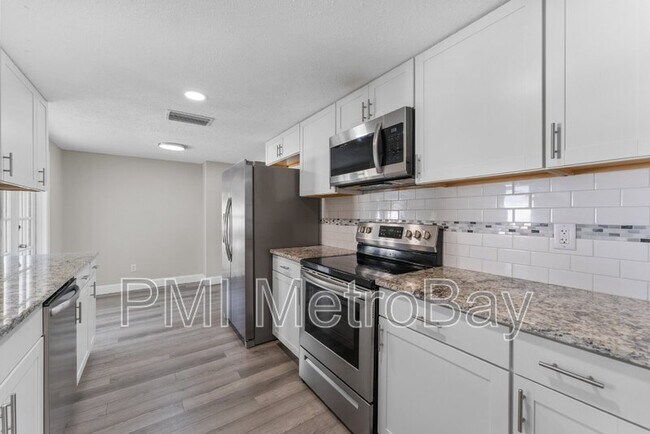 Building Photo - 6121 N Falkenburg Rd