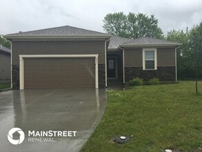 Building Photo - 213 NE Kim Ct