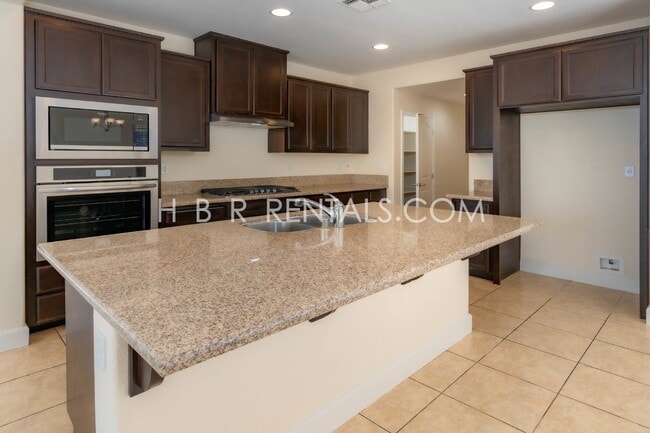 Building Photo - Spacious 4-Bed, 3-Bath Home with a Beautiful Garden in Mountain House! *FIRST FLOOR BEDROOM and F...