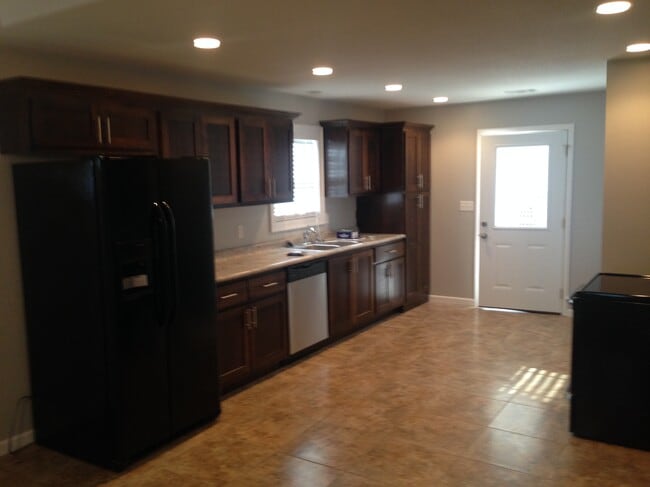 kitchen leading into garage - 701 S 5th St