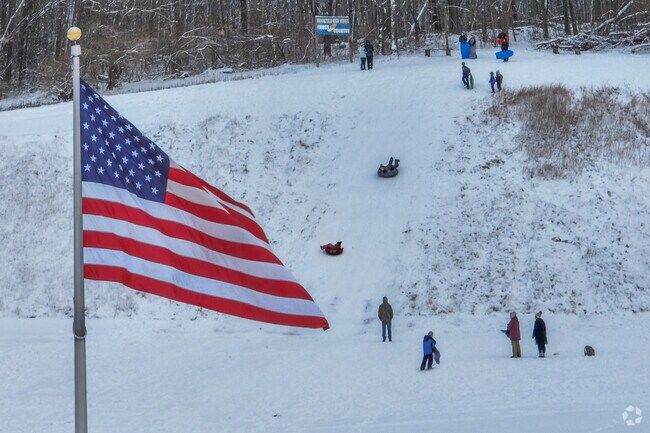 Dress warmly and sled down the hills behind Brookfield High School.