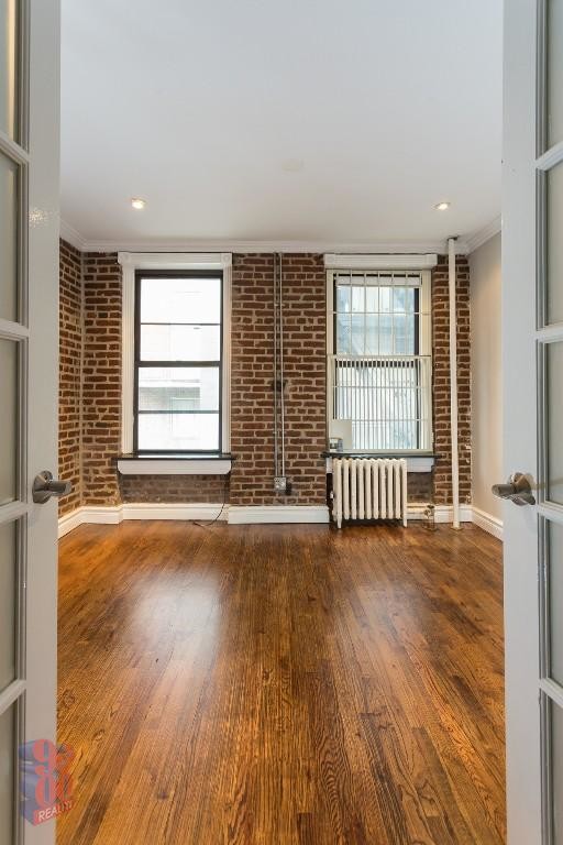 Foto del edificio - 221 E 23rd St