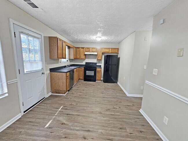 Building Photo - 5477 Denny Dr