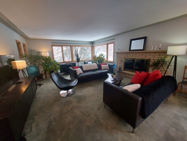 Living Room w/wood burning fireplace - 4401 Avondale Rd