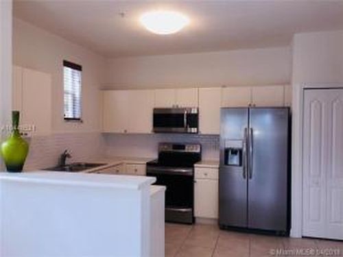 Building Photo - 160 Jacaranda Country Club Dr