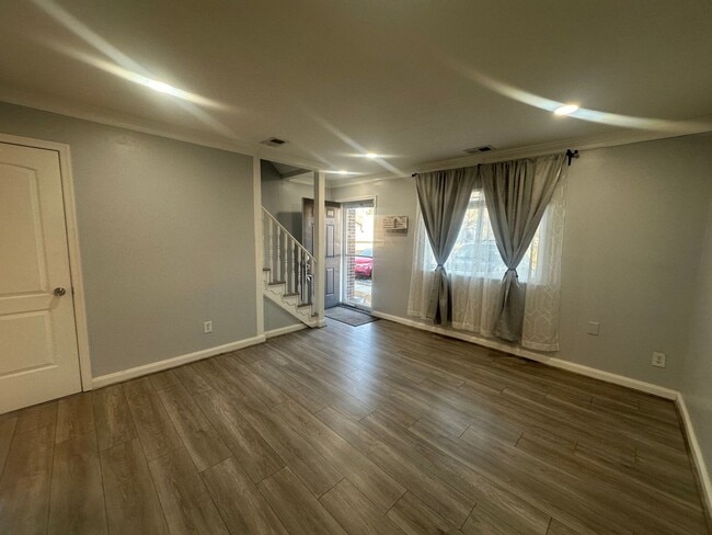 Building Photo - Centrally Located 2 BR Green Townhome with Fenced Patio