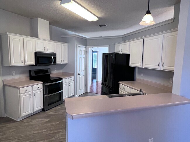 Building Photo - 8368 Elan Dr