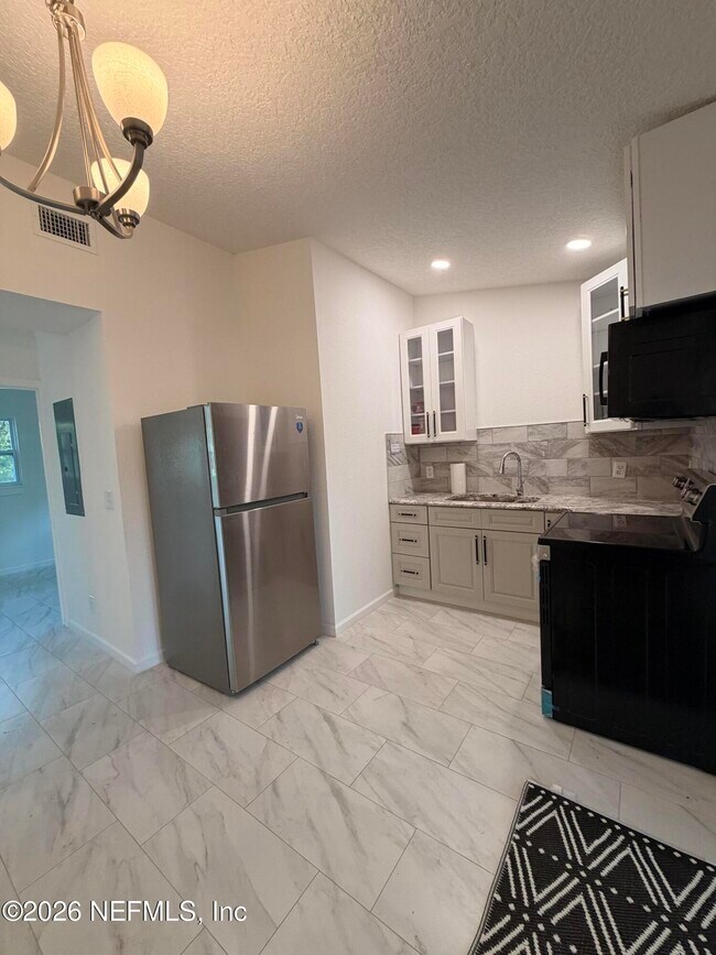 Building Photo - 7178 Karenita Dr