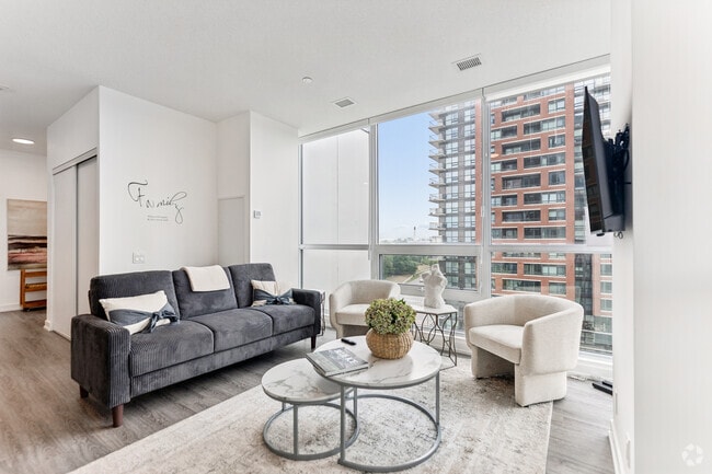 2BR, 2BA - 710SF - Living Room - Vision at Pat Bayly Square