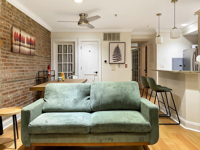 Living room and kitchen area. - 328 Garden St