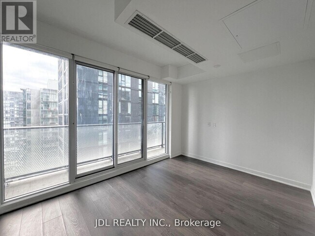 Building Photo - 115-3115 Blue Jays Way