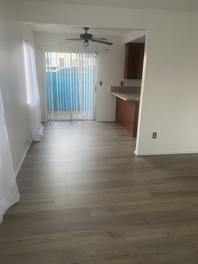 dining room with ceiling fan - 19201 Coenson Cir