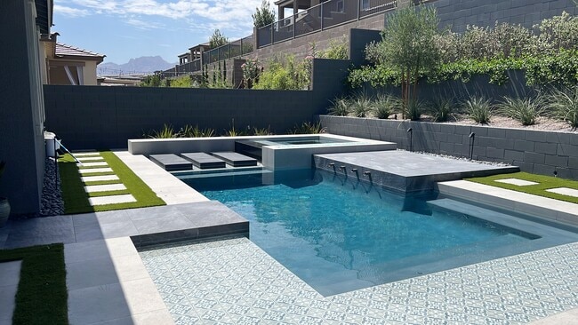 Architectural pool in backyard with spa, waterfall and fire feature. - 331 Coastal Redwood St