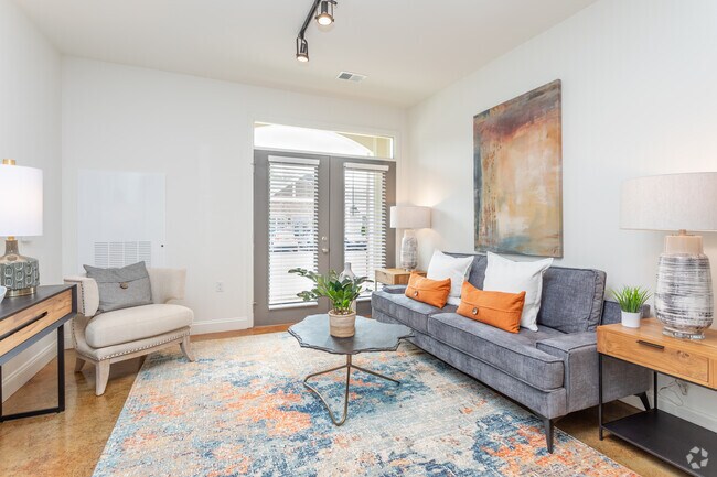 1BR, 1BA - 724SF A1C - Sala de estar - Comet Garner