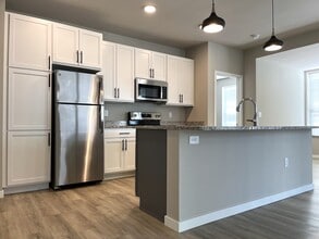Stainless, Quartz, Island, Pantry - The Summit Residences