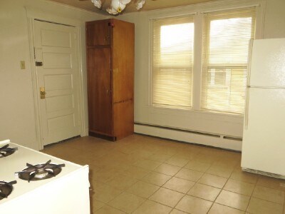 Kitchen Pantry Closet and Door to Porch and Storage - 174 Carey Ave