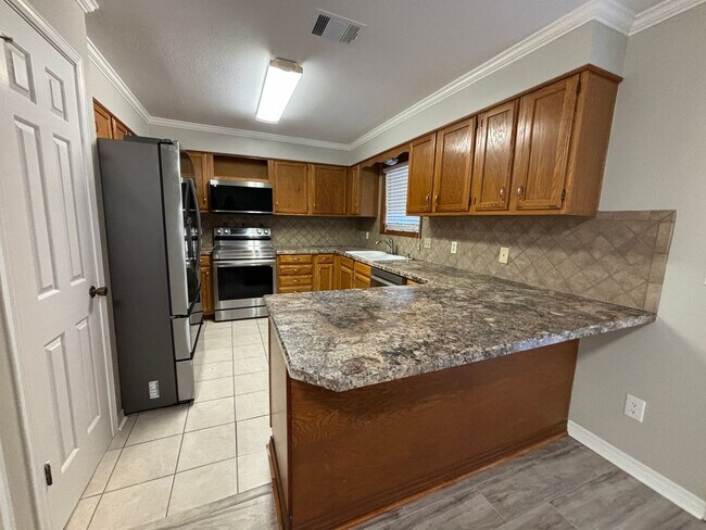 Building Photo - Half off the first Full Months rent! Close...
