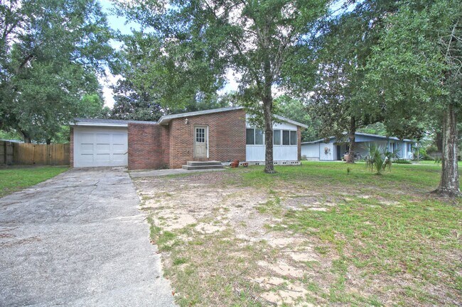 Building Photo - Beautifully updated 3/2 brick home w/ hard...