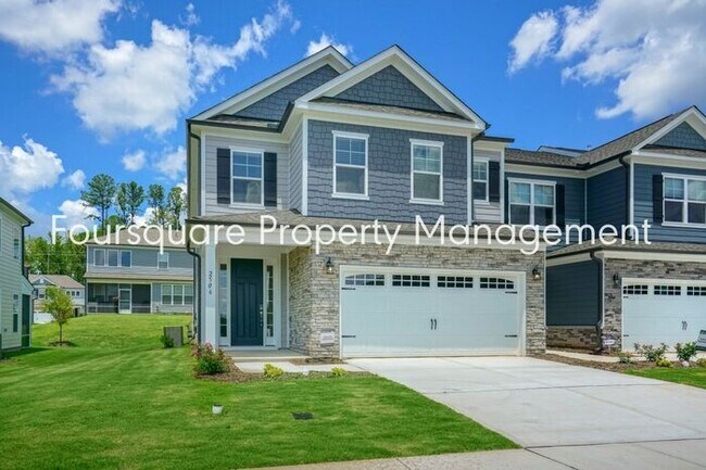 Building Photo - Townhome | Hardwood Flooring | 2 Car Garage