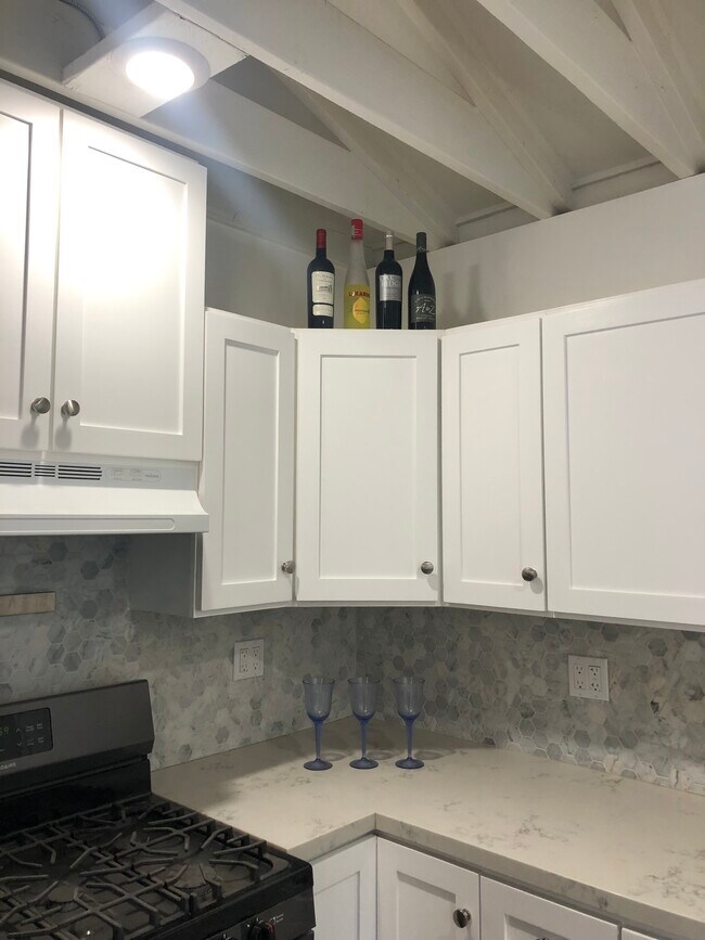 High wood beamed ceilings throughout - 4228 Lockwood Ave