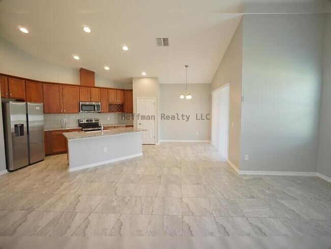 Building Photo - 7076 Gulf Cypress Ave