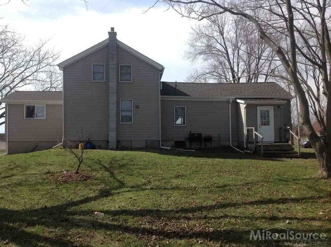 Building Photo - 8891 Almont Rd