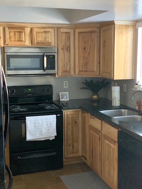 Updated kitchen granite counter tops - 2600 Brookside Dr