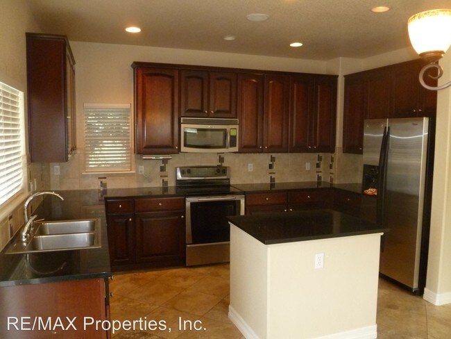 Building Photo - 4 br, 2.5 bath House - 8104 Knotty Alder Ct