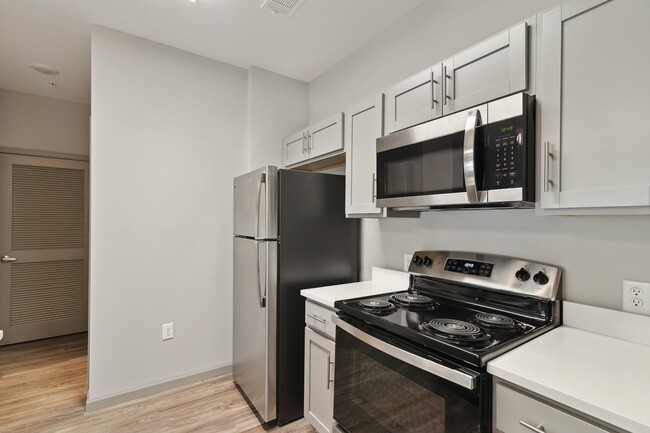 Newly Renovated Kitchen - Riverwalk Apartments