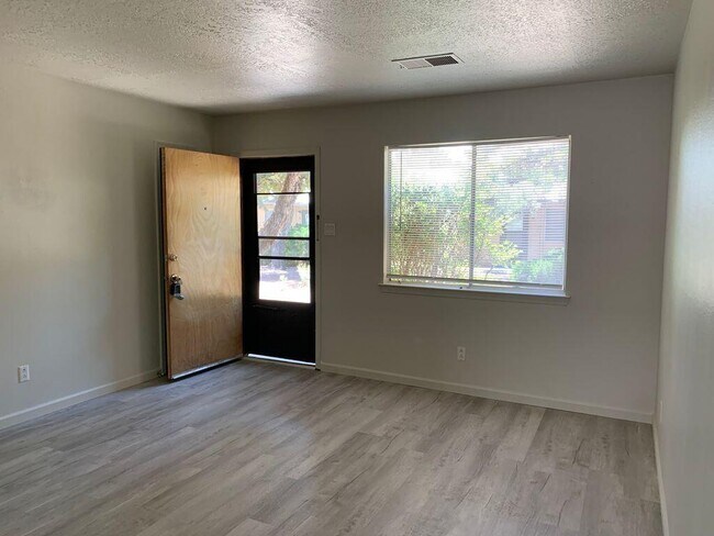 Building Photo - 1713 Paisano St NE