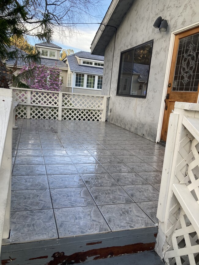 Deck by front door - 150 Amalfi Dr