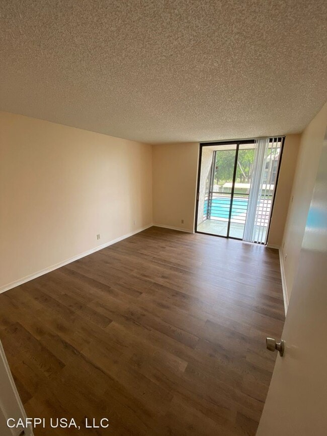Building Photo - 2 br, 2 bath House - 7650 W McNab Road #206
