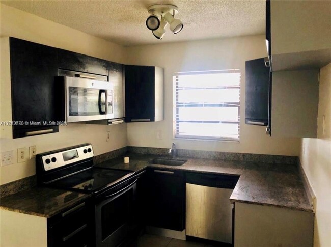 Building Photo - 11213 Royal Palm Blvd