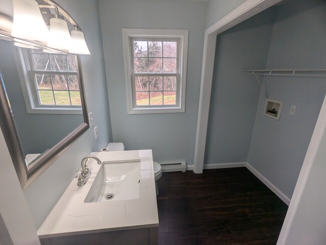 First floor half bath/laundry room - 44 Albe Dr