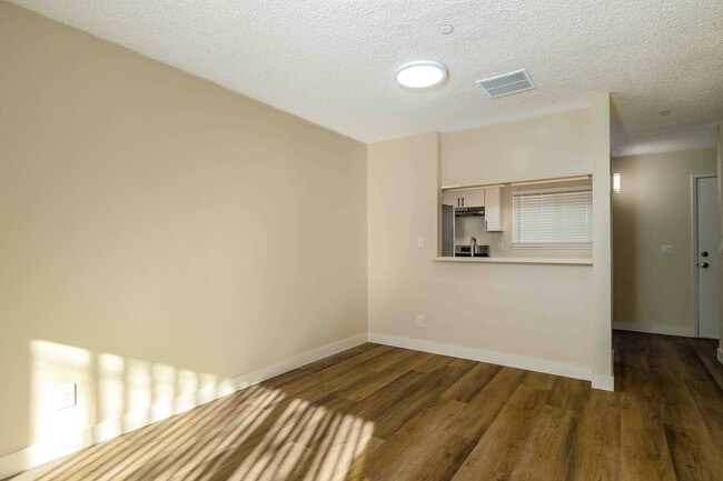 2 BR, 1.5BA Townhouse Dining Area - Mission Village Apartments