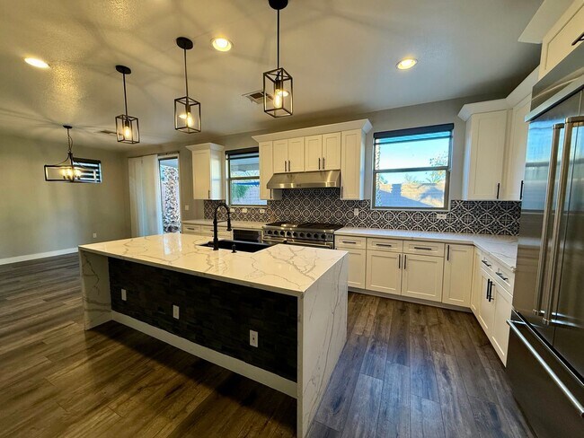 Building Photo - Luxury Living Redefined: Stunning 4/ BD 2....