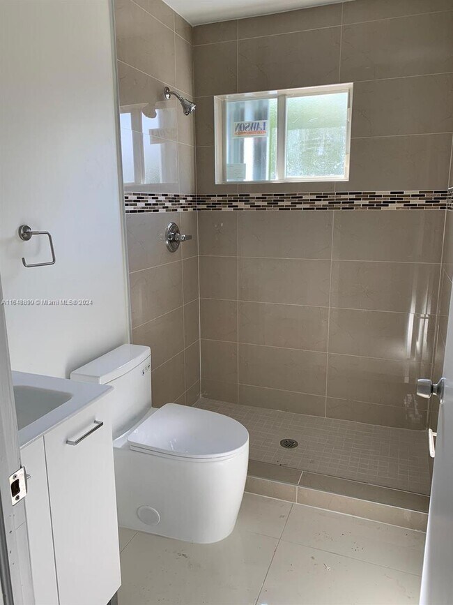 Building Photo - 4491 NW 23rd Ave