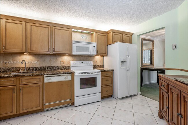 Building Photo - 5750 Camino Del Sol