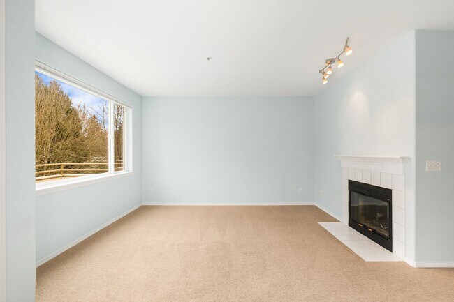 Building Photo - Spacious 2-Bed, 2-Bath Condo with Large Ga...