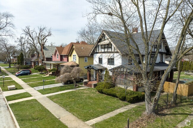 Row of bungalow-style homes located along a residential street.