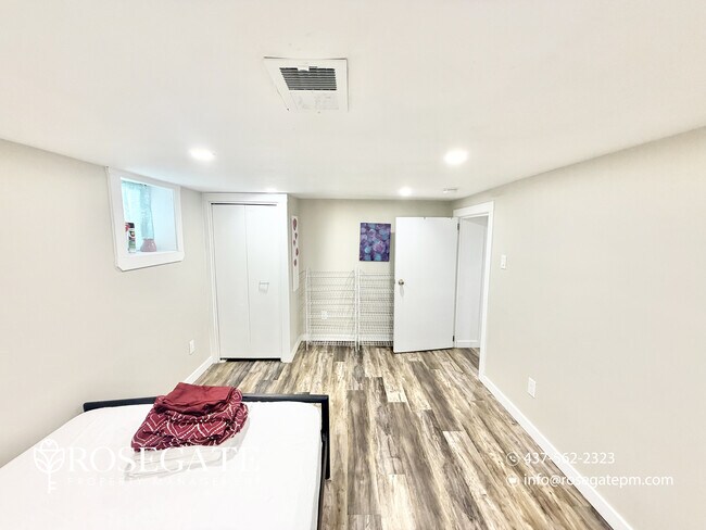 Photo du bâtiment - Cozy 2-Bedroom Basement Suite in the Heart...