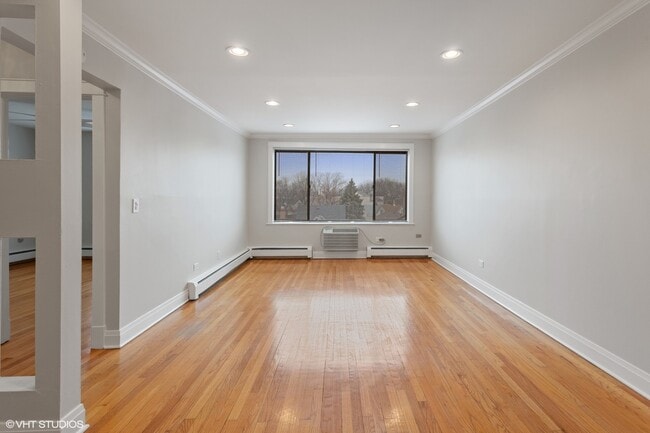 Building Photo - 6060 N Ridge Ave
