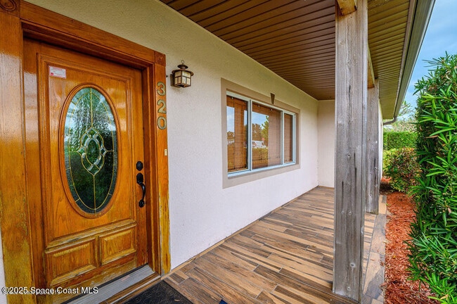 Building Photo - 320 Pine Tree Dr