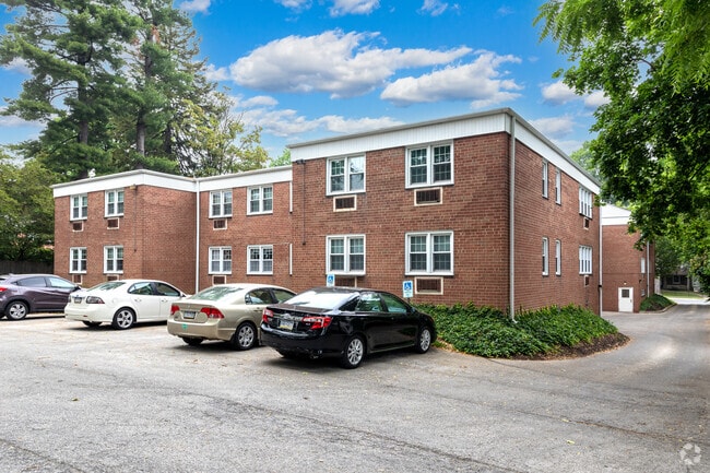 Merioneth Apartments Parking Lot and Alternate Building Photo - Merioneth Apartments