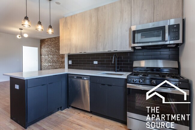 Foto del edificio - 4013 N Lowell Ave